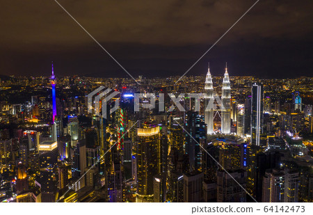 Aerial view of Kuala Lumpur city center skyline at night 64142473