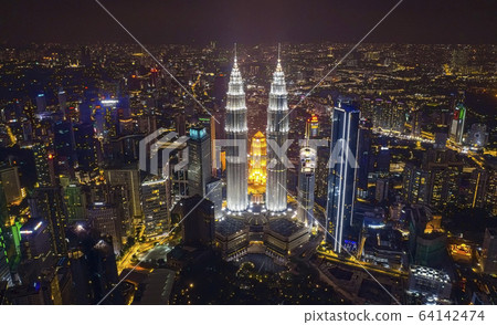 Aerial view of Kuala Lumpur city center skyline at night Aerial view of Kuala Lumpur city center skyline at night 64142474