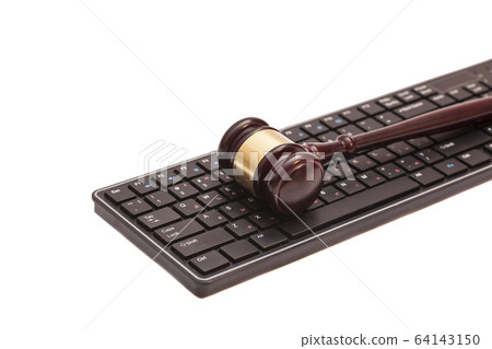 Gavel on black computer keyboard Gavel on black computer keyboard 64143150