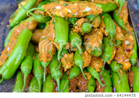 Famous Indian Street food, Fried Spicy Chilli Pakora in Jodhpur 64144478
