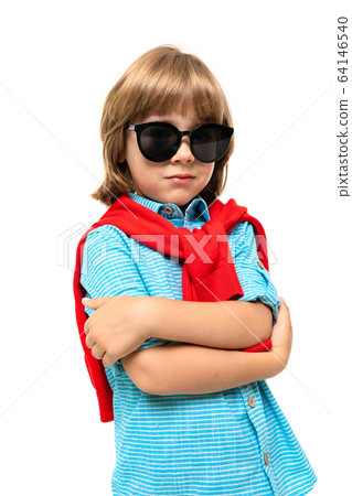 handsome european boy in sunglasses posing on white isolated studio background handsome european boy in sunglasses posing on white isolated studio background 64146540