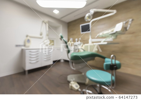 Blurred photo of modern hospital with children dentistry Blurred photo of modern hospital with children dentistry 64147273
