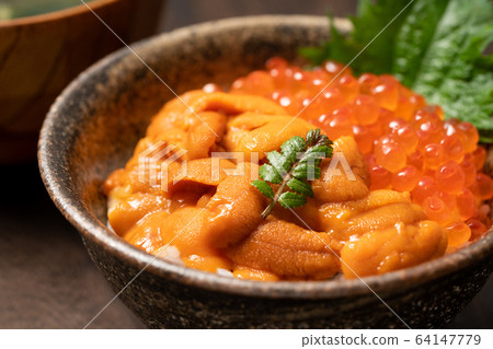 Bowl of rice dumplings 64147779