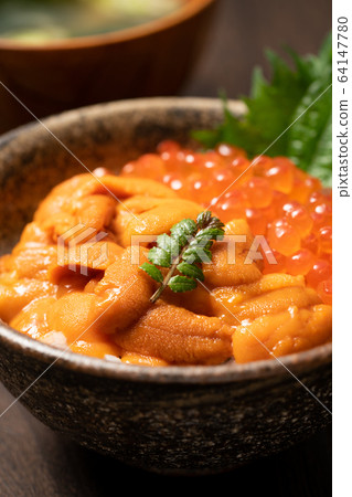 Bowl of rice dumplings 64147780