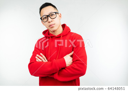 beautiful brunette asian in red sweater and glasses for vision poses on a white background 64148051