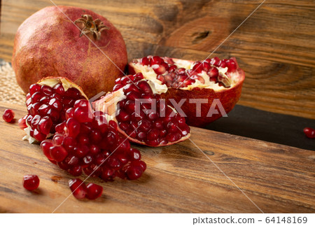 Fresh Ripe Organic Pomegranate Fruit with Juicy 64148169