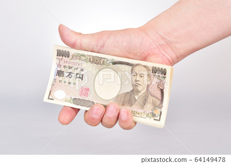 Image of holding cash Image of holding cash 64149478