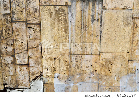 Texture of old shabby stone yellow porous  64152187