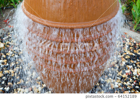 A beautiful little fountain in the form 64152189