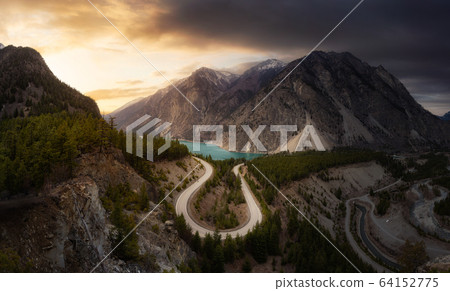 Aerial View of a Scenic Road in the Canadian Mountain Landscape Aerial View of a Scenic Road in the Canadian Mountain Landscape 64152775