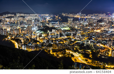 Panorama aerial view of Hong Kong Kowloon Crowded Buildings at night time 64158404