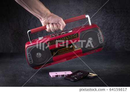 Vintage radio cassette recorder on a dark 64159817