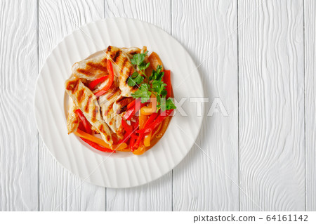 Sweet peppers with grilled chicken, copy space Sweet peppers with grilled chicken, copy space 64161142