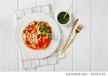 Easy low-fat dish of bell peppers with chicken 64161143