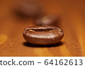 Macro shot of roasted coffee beans 64162613
