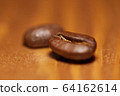 Macro shot of roasted coffee beans 64162614
