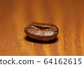 Macro shot of roasted coffee beans 64162615