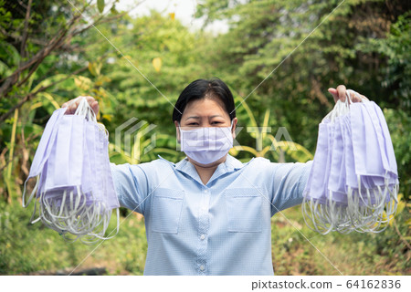 Woman wearing mask protection epidemic flu covid19 Woman wearing mask protection epidemic flu covid19 64162836