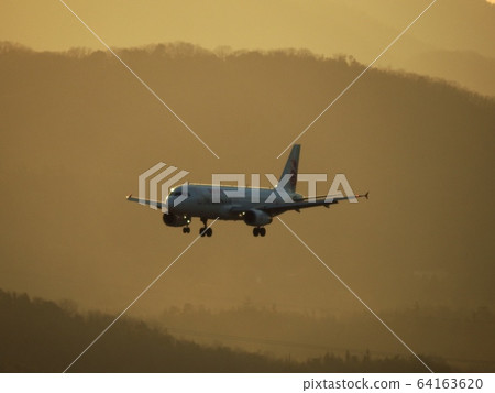 Airplane (sunset) Airplane (sunset) 64163620