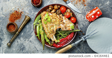Plate with roasted turkey Plate with roasted turkey 64164461
