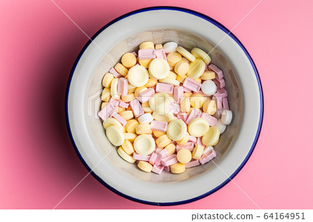 Mix of hard colorful candies. 64164951