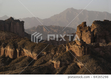 Binggou Danxia Landform National Park, beautiful rock formation in Zhangye, Gansu during sunset golden hour Binggou Danxia Landform National Park, beautiful rock formation in Zhangye, Gansu during sunset golden hour 64165298