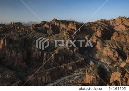 Binggou Danxia Landform National Park, beautiful rock formation in Zhangye, Gansu during sunset golden hour Binggou Danxia Landform National Park, beautiful rock formation in Zhangye, Gansu during sunset golden hour 64165305