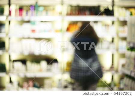 Blurred image of woman shopping 64167202