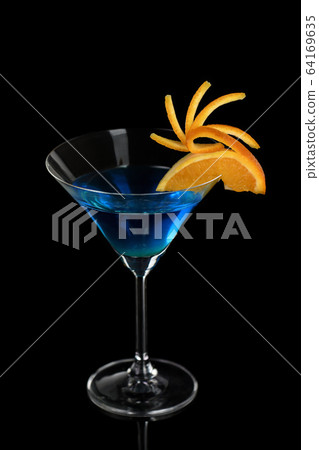 Orange decor Martini Blue Curacao on a black 64169635