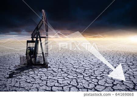 Oil rig in the desert on a background of a dramatic sky. Rusty sign with down arrow. Symbol of the collapse in the oil industry Oil rig in the desert on a background of a dramatic sky. Rusty sign with down arrow. Symbol of the collapse in the oil industry 64169868
