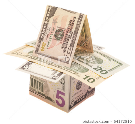 Houses from dollars banknotes. Isolated over white 64172810