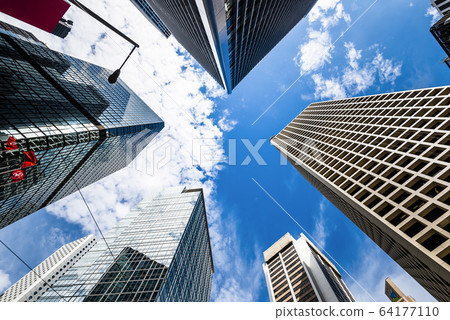 low angle view of modern office block buildings in Hong Kong low angle view of modern office block buildings in Hong Kong 64177110