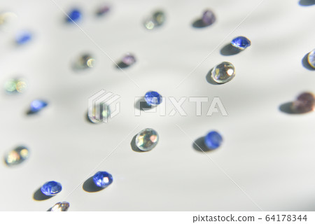 rhinestones of different colors on the white rhinestones of different colors on the white 64178344