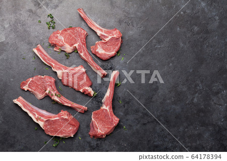 Lamb ribs cooking. Raw rack of lamb Lamb ribs cooking. Raw rack of lamb 64178394