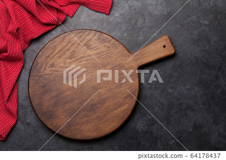 Kitchen table with cutting board and tablecloth Kitchen table with cutting board and tablecloth 64178437