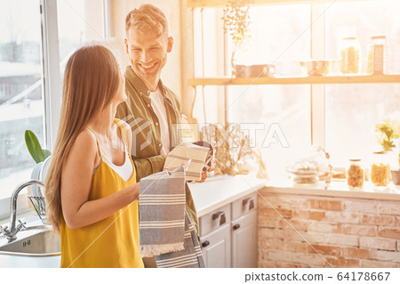 Delighted young people looking at each other 64178667