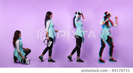 Woman wearing virtual reality headset. Image with glitch effect 64178731