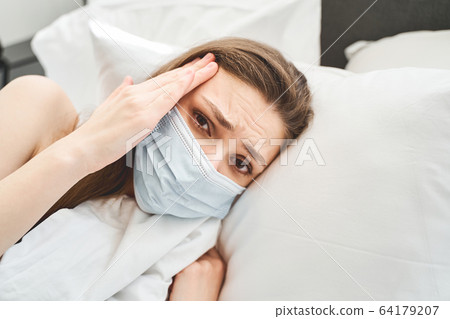 Female patient suffering from a viral infection 64179207