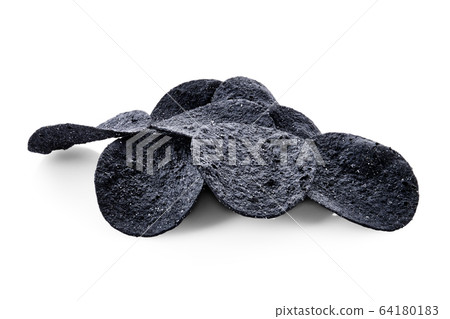 Black crispy spicy potato chips isolated on white background with full depth of field 64180183