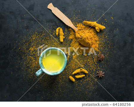 Golden Milk, made with turmeric. Golden Milk, made with turmeric. 64180256