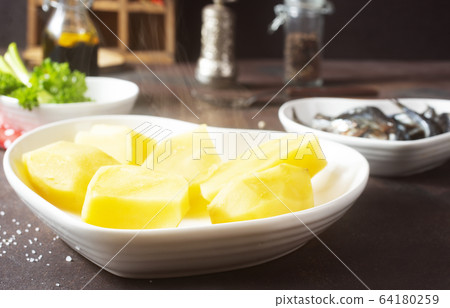 potato with fish 64180259