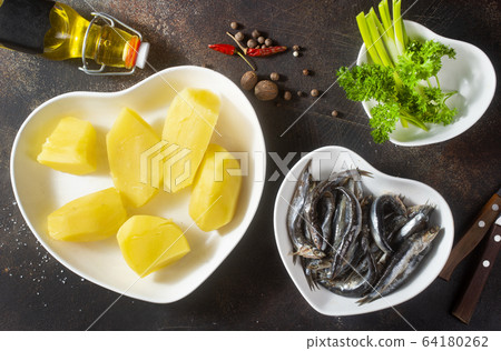 potato with fish potato with fish 64180262