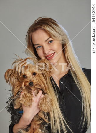 Portrait of young woman with dog Portrait of young woman with dog 64180748