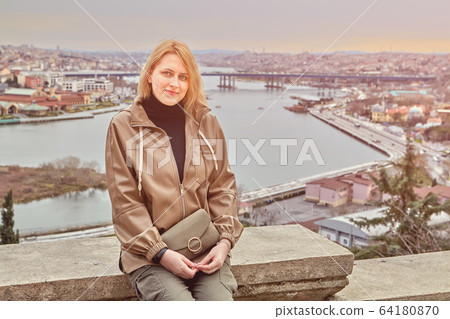 Young woman at the Pierre Loti viewpoint. 64180870