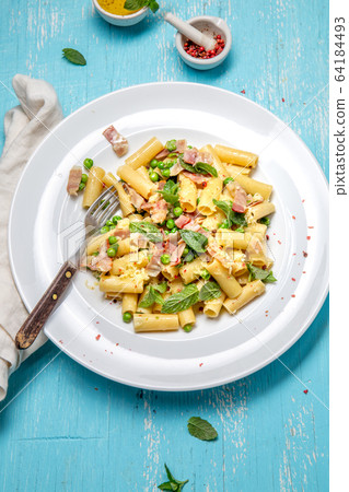 Italian recipe Pasta tortilloni with green pea, Italian recipe Pasta tortilloni with green pea, 64184493