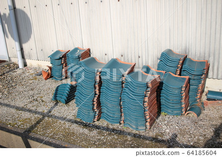 Pile of roof tiles Pile of roof tiles 64185604