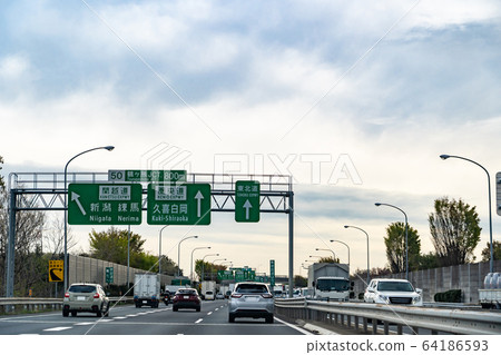 Saitama Tsurugashima Junction A car running on the Keio Expressway 64186593