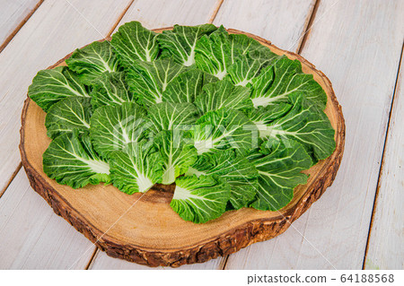 Spring vegetables and herbs, close up of nutritious greens sprouting in spring. 107 64188568