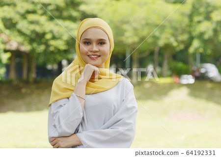 Cheerful Muslim girl 64192331
