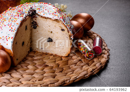 Easter eggs gold and bronze and Easter cake Easter eggs gold and bronze and Easter cake 64193962